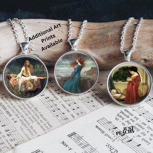 May include: Three silver-toned pendant necklaces with round, glass-covered images of classical art. The images feature women in various settings, with the text "Additional Art Prints Available" visible.
