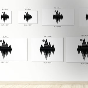 May include: A black and white geometric mountain range design with a circle in the top left corner. The design is available in various sizes, from 30 x 20 cm to 140 x 70 cm.