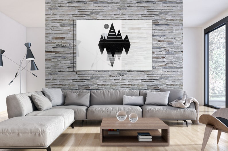 May include: A black and white geometric mountain range print with a circle above the peaks. The print is on a white background and measures 80 cm by 120 cm.