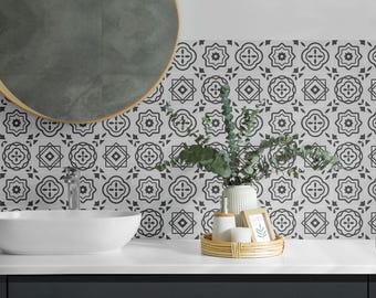 May include: Black and white patterned tile stickers for a bathroom or kitchen backsplash. The stickers are arranged in a geometric pattern and feature a modern design.