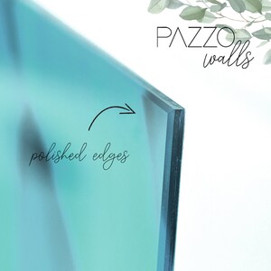 May include: A close-up of a blue glass panel with polished edges. The text "PAZZO walls" is visible in the top right corner of the image.