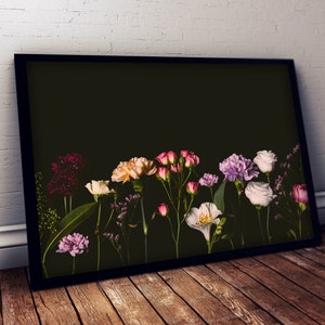 May include: A framed print of a floral arrangement featuring a variety of flowers in shades of pink, purple, and white against a black background.