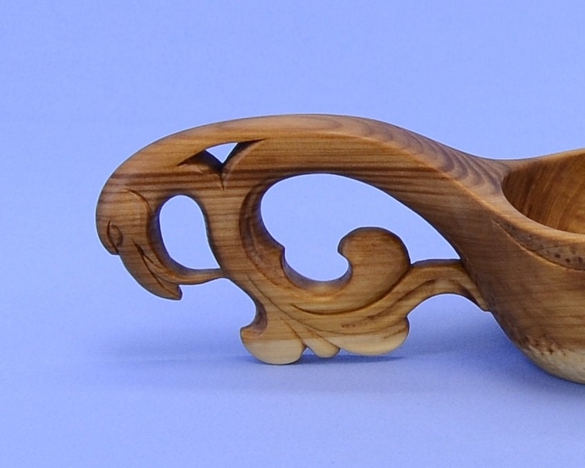 Handmade wooden bucket handle with a Griffin's head on Etsy