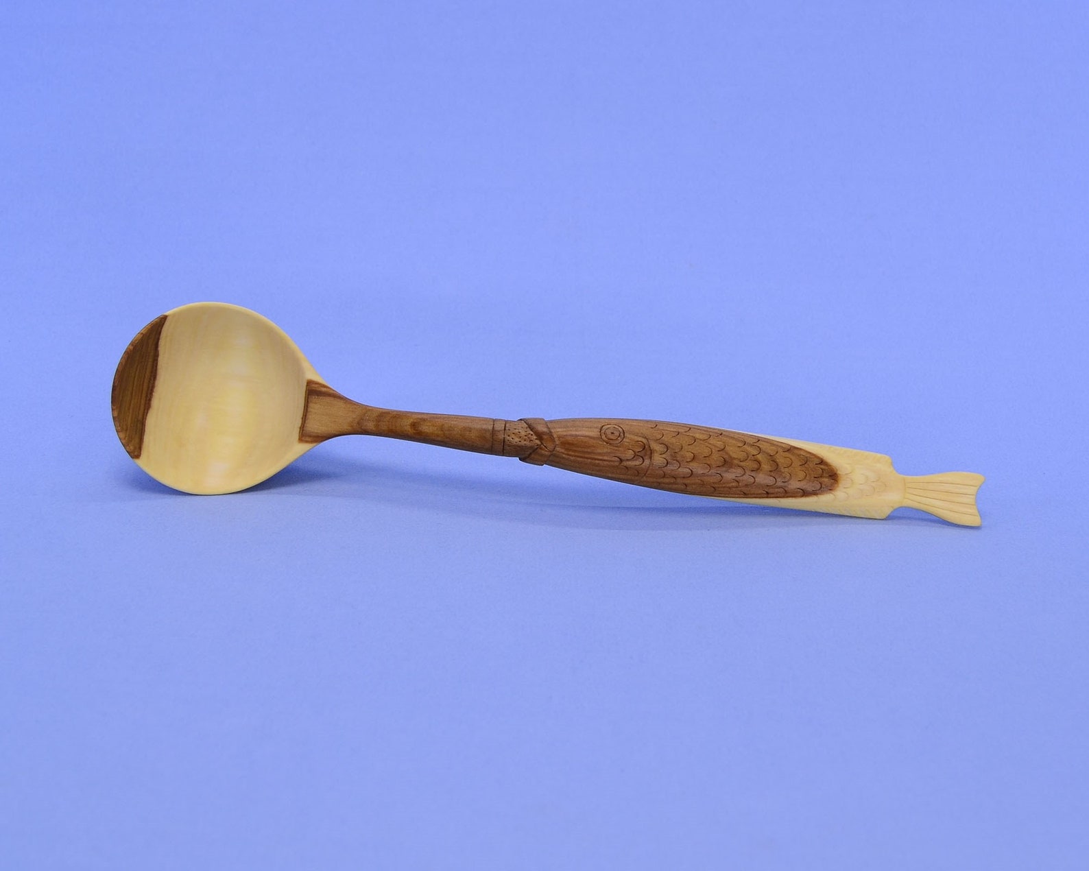 Beautiful handmade wooden spoon. With a carved handle in the Etsy