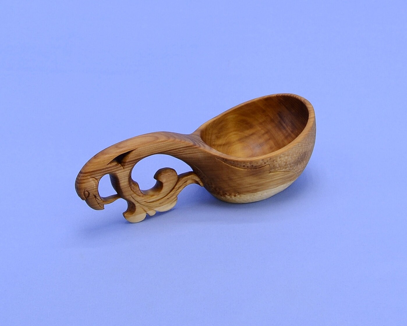 Handmade wooden bucket handle with a Griffin's head on Etsy