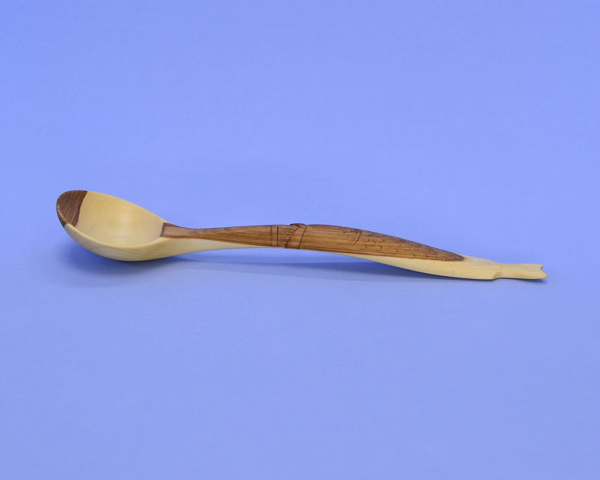 Beautiful handmade wooden spoon. With a carved handle in the Etsy