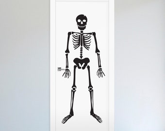 May include: A black skeleton decal on a white door. The full-body skeletal figure features detailed rib cage, spine, and limb structures. The door has a silver handle and is set against a light grey wall. Ideal for Halloween.