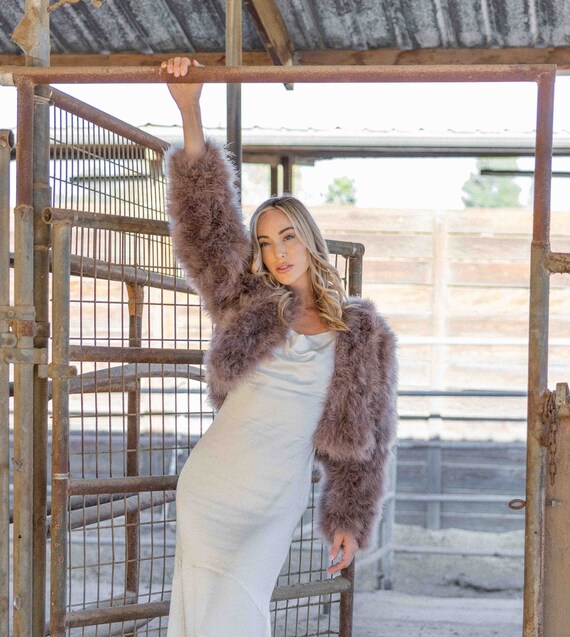Long sleeve dress top with fur vest