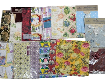 May include: Assortment of wrapping paper featuring various patterns and designs, including floral, geometric, and whimsical themes. The paper is packaged in plastic sleeves and includes the Hallmark brand logo.
