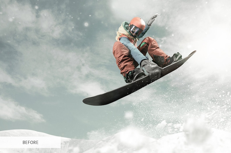May include: A person wearing a helmet and winter clothing is snowboarding in the air. The snowboarder is performing a trick with their body in a crouched position. The background is a cloudy sky with snow falling.
