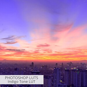 May include: A city skyline at sunset with a vibrant orange, pink, and purple sky. The image is a digital filter or LUT for use in photo editing software.