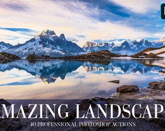 May include: A scenic landscape photo with a mountain range reflected in a still lake. The sky is a mix of blue and pink with white clouds. The mountains are snow-capped and the lake is surrounded by rocks. The text "AMAZING LANDSCAPE" and "40 PROFESSIONAL PHOTOSHOP ACTIONS" is at the bottom of the image.