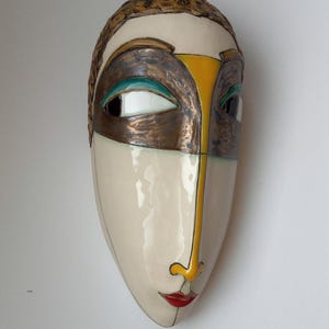 artisan ceramic mask, decorative face mask, unique wall sculpture, handmade pottery mask, artistic wall hanging, sculptural wall decor
