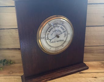 Barómetro publicitario de mesa Schweppes Waters vintage, vitrina de madera para pared, letrero de pub, 11,5 x 11 pulgadas, vintage de la década de 1920, en funcionamiento.
