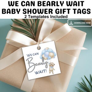 May include: A wrapped gift with a cream-colored ribbon and a tag that reads "We Can Bearly Wait!" The tag features a teddy bear holding balloons. The text "Baby Shower Gift Tags" is at the top.