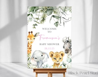 May include: A baby shower sign featuring watercolor illustrations of a giraffe, zebra, elephant, and lion. The sign reads "Welcome to Francesea's Baby Shower 28.12.25" with botanical accents. The sign is displayed on a wooden easel.