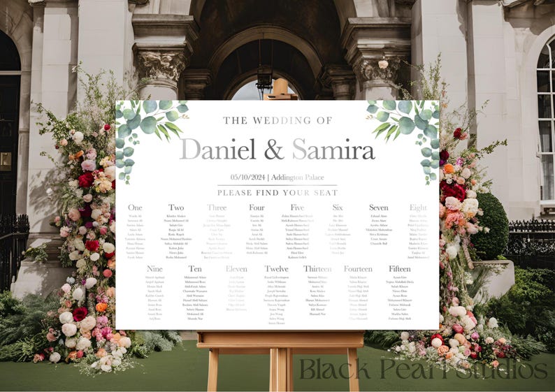 May include: A wedding seating chart with a white background and green eucalyptus leaves on the top and bottom. The chart is titled "The Wedding of Daniel & Samira" with the date "06/10/2024" and location "Addington Place". The chart lists table numbers from one to fifteen with guest names under each table number.