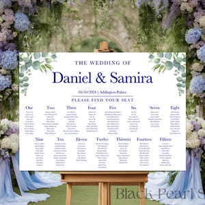 May include: A wedding seating chart with a white background and green eucalyptus leaves. The chart is titled "The Wedding of Daniel & Samira" and includes the date "05/10/2024" and the location "Addington Palace". The chart lists table numbers from one to fifteen with guest names under each table number.