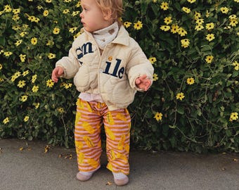 Gestreepte peuterbroek met boterprint