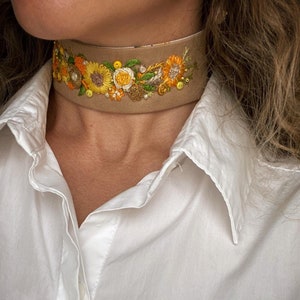 Embroidered choker floral design.