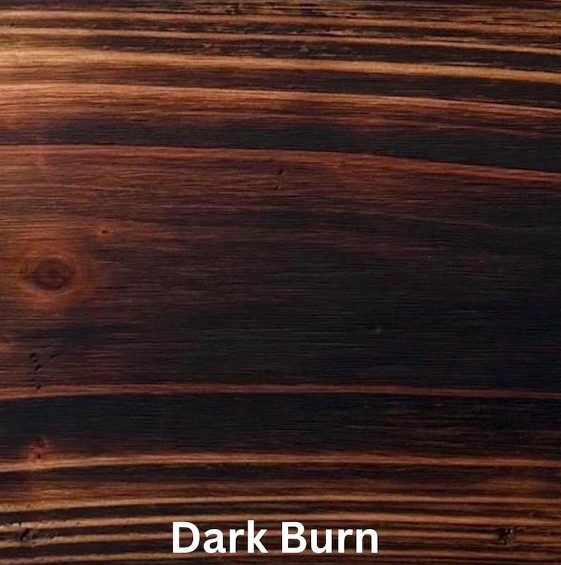 May include: Close-up of a wood grain pattern with a dark brown, almost black, color. The wood grain has a textured appearance with visible lines and knots. The text "Dark Burn" is displayed at the bottom of the image.
