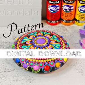 Puede incluir: Una piedra mandala pintada a mano con un diseño vibrante y colorido. La piedra presenta un círculo central púrpura rodeado de intrincados patrones en tonos de azul, verde, amarillo y rosa. El texto "Pattern" y "DIGITAL DOWNLOAD" también son visibles.