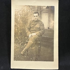 Antique 1910s U.S. Army Military Soldier Sitting on Table Photograph Photo Unused Postcard