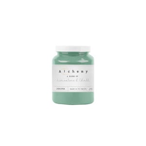 May include: A round jar of green paint labeled "Alchemy, A Blend of Limestone & Chalk, Juniper, Paint by Fusion".