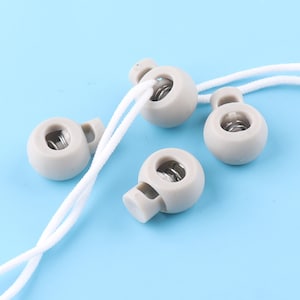 23mm/6mm/grigio/elastico cavo Toggle Cord Lock Cord Toggle Lock, Rope Ends Cord Ends Cord Ends,Craft Cord Locks,Cylinder Stopper Toggle