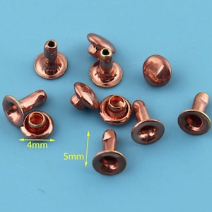 May include: A close-up of ten copper-colored metal rivets. The rivets are 4 mm in diameter and 5 mm in length.