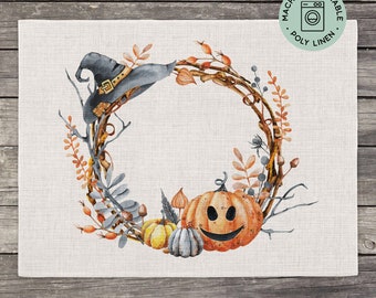 May include: A Halloween-themed wreath with a witch's hat, pumpkins, and fall foliage. The wreath is made of twigs and has a rustic look. The pumpkins are orange and have a carved jack-o'-lantern face. The wreath is machine washable and made of poly linen.