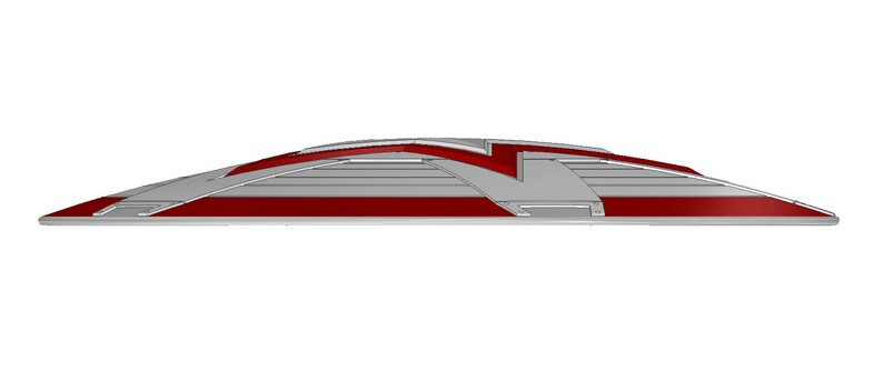May include: A silver and red speed bump with a raised, angled design. The speed bump is designed to slow down vehicles.