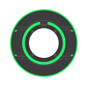 May include: A black and green circular object with a ring of green light around the center hole. The object has a textured surface and a small black ring around the center hole.