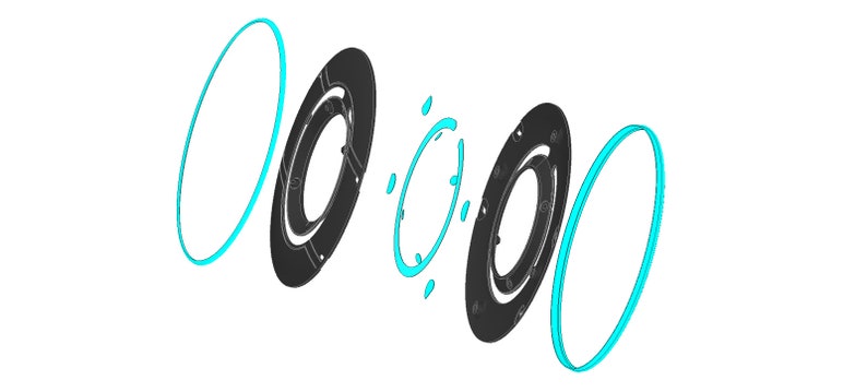 May include: A set of four black and turquoise rings, with two of the rings having a center hole. The rings are arranged in a staggered pattern.