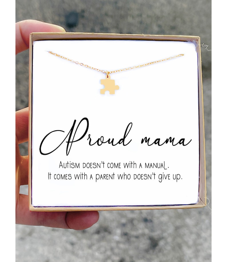 May include: A handmade wooden sign with the text "Welcome" in a playful font. The sign features a distressed white background and a dark stained wooden frame. A small, decorative heart is attached to the sign.