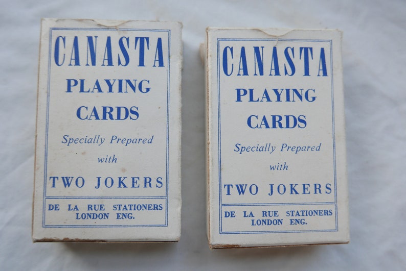 rule book and score cards Barden Canasta used once. full boxed set including plastic score card two sets of De La Rue playing cards
