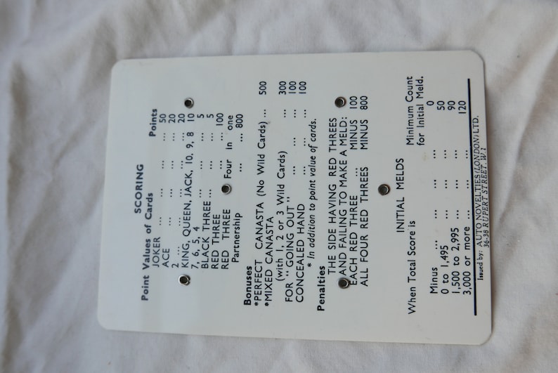 rule book and score cards Barden Canasta used once. full boxed set including plastic score card two sets of De La Rue playing cards