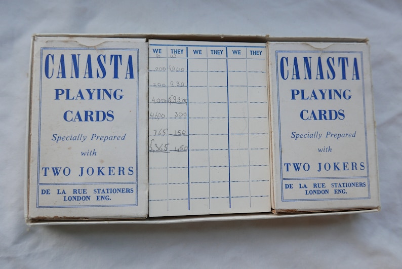rule book and score cards Barden Canasta used once. full boxed set including plastic score card two sets of De La Rue playing cards
