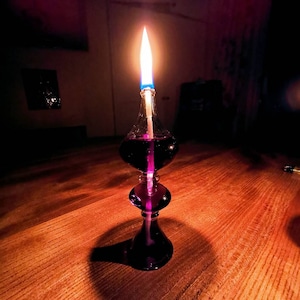 Hand blown glass oil lamp