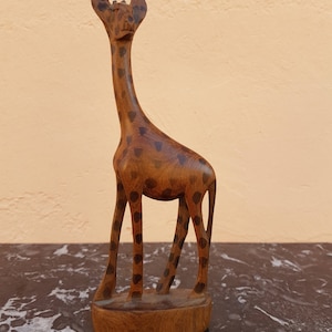 A wonderful mahagoni wood giraffe