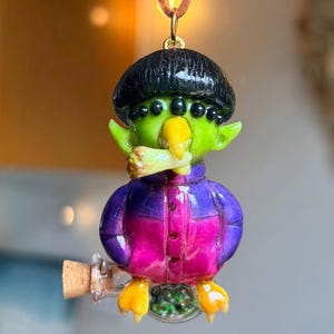 Alien boy sculpture necklace inspired by Oliver tree LED light effective
