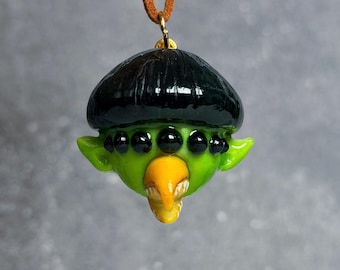 Alien boy sculpture necklace inspired by Oliver tree