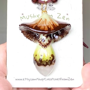 Mushroom Zen’s signature design Glow in dark earthy drippy inky mushroom glow in the dark mushroom charm + Clear Quartz