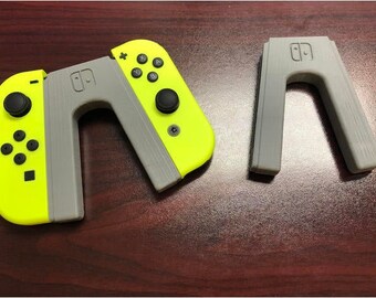 Nintendo Switch joy-con grip | Controller | Gaming | Geeky | Joy-con | Video Game | The Legend of Zelda | Super Mario Odyssey | Mario Kart 8