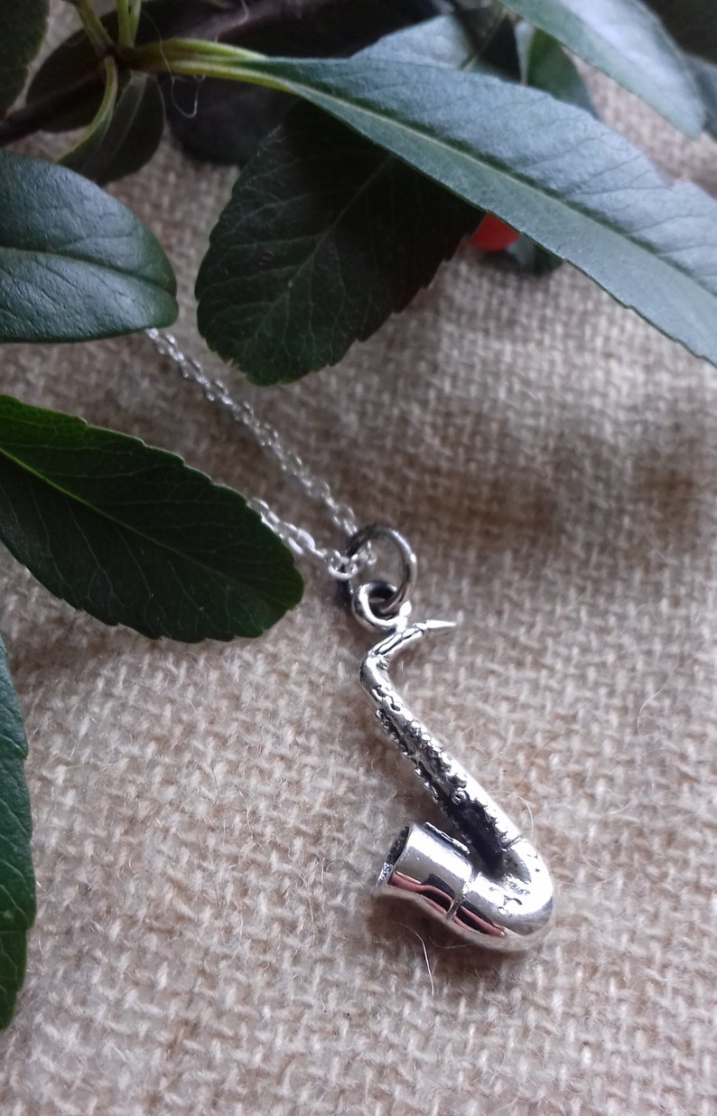 Mixed solid silver saxophone pendant