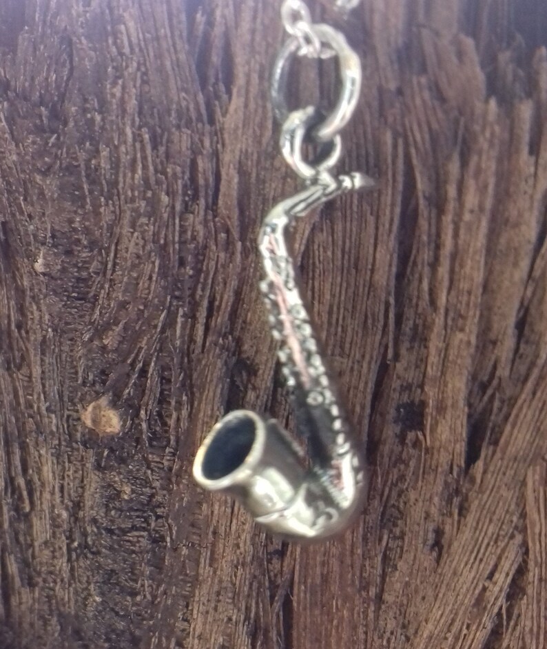 Mixed solid silver saxophone pendant