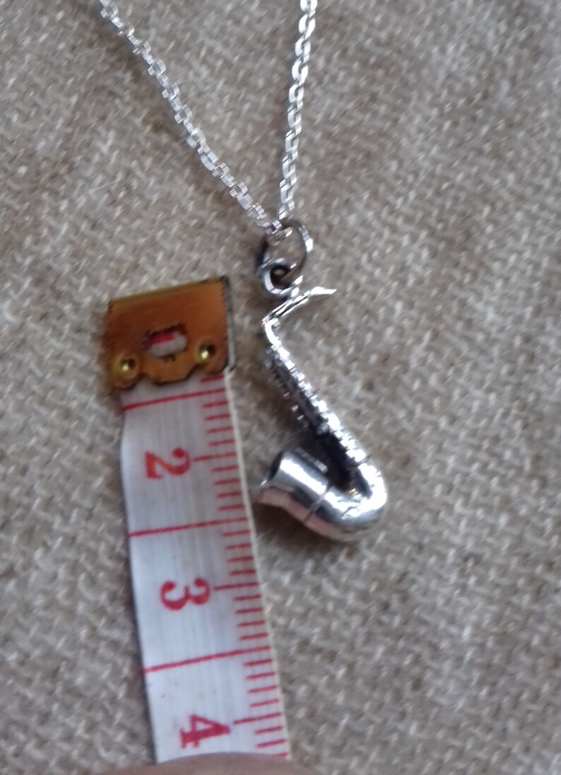 Mixed solid silver saxophone pendant