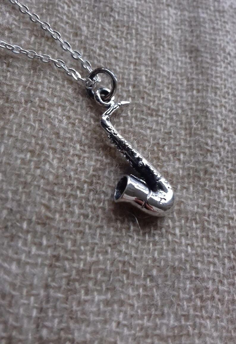 Mixed solid silver saxophone pendant