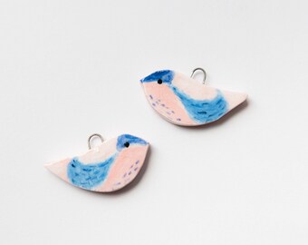 Hand-painted Sarreve porcelain bird charms for jewelry creation