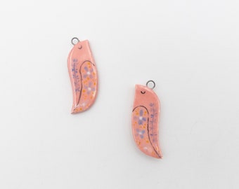 Ceramic bird pendants, hand painted on both sides, ideal for creating earrings and other jewelry.